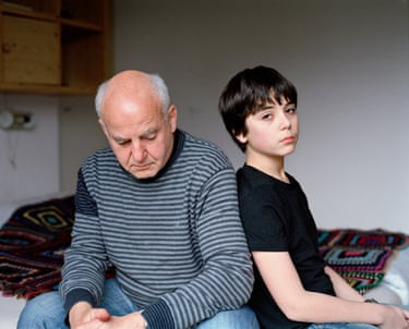 Julian and Jonathan, February 2013I took this portrait in my father’s bedroom, standing outside on the small balcony with my camera on a tripod to create some distance. I’m always fascinated by the way bodies touch. Jonathan was 12 years old here and had just gone through a radical physical transformation. I love the dynamics between him and my father—my father, on the left, slightly slumped over, while Jonathan sits up straight, leaning against him, gently pressing his shoulder into his arm.