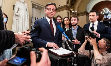 US speaker of the House, Mike Johnson, with reporters after the House approved $95bn in foreign aid to Ukraine, Israel, and Taiwan.