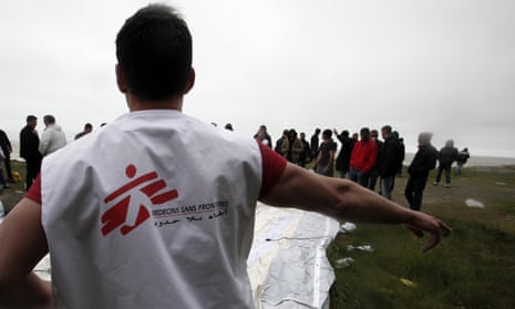 An MSF member at a makeshift camp near Dieppe, northern France.