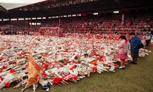 FILES-FBL-ENG-PR-LIVERPOOL-BRITAIN-DISASTER-INQUEST<br>(FILES) In this file photo taken on April 20, 1989 Thousands of flowers, wreaths and tributes are displayed on the Anfield stadium pitch 20 April 1989 in memory of the 96 soccer fans who died after support railings collapsed during a match between Liverpool and Nottingham forest in Sheffield. - The number of Liverpool fans unlawfully killed in the Hillsborough stadium disaster has risen to 97, after a coroner's ruling on the death of a man injured in the crush. Andrew Devine was badly hurt in the tragedy at the FA Cup semi-final on April 15, 1989 and died after 32 years from aspiration pneumonia. (Photo by - / AFP) (Photo by -/AFP via Getty Images)