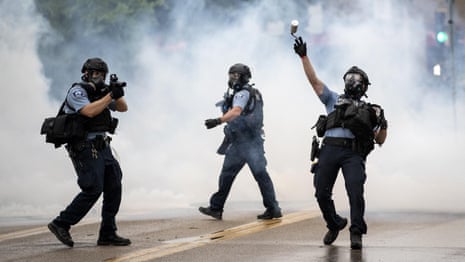 Minneapolis police fire teargas at protesters after death of George Floyd – video
