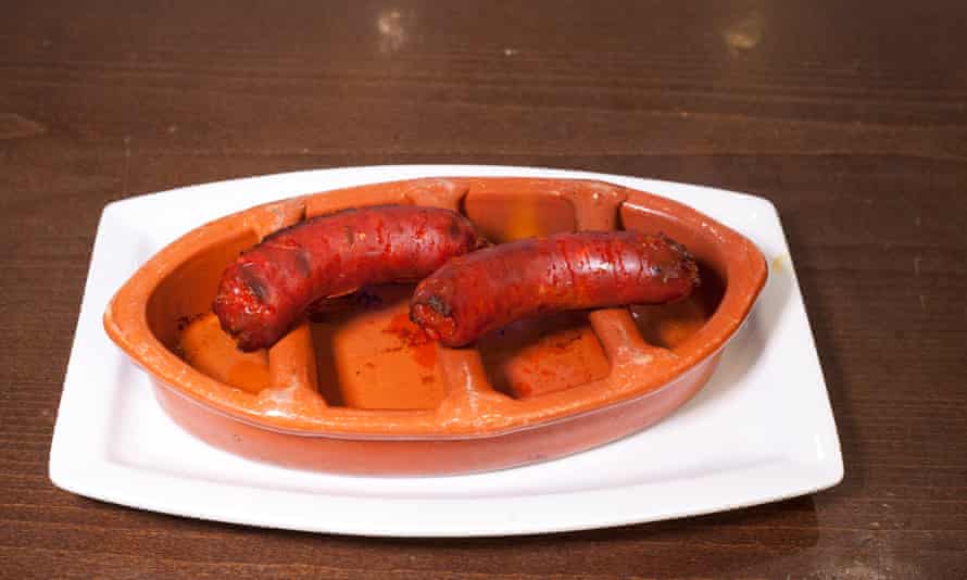 ‘Thick taut-skinned lengths arrive in custom-designed terracotta dishes’: chorizo.