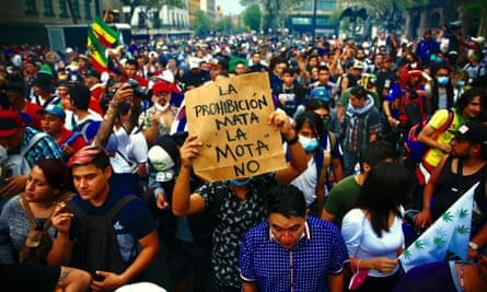 ‘Prohibition kills, cannabis does not’, says one sign held by an activist as thousands marched in March for an annual demonstration in Mexico City calling for legalisation.