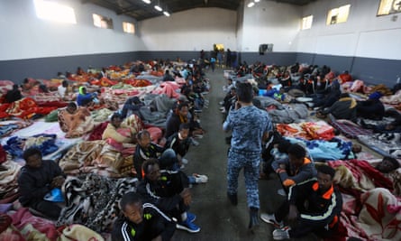 detention libyan centre asylum funding seeker centres sue migrants outskirts tripoli shelter sit capital immigration mahmud turkia photograph