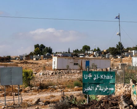 mobile home with mobile mast in arid open landscape