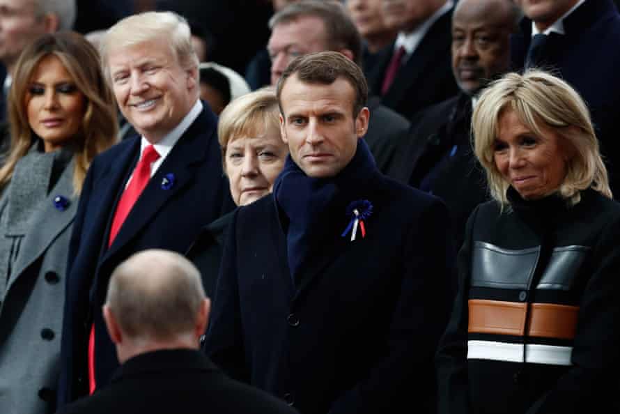 Donald and Melania Trump with Angela Merkel, Macron, Brigitte Macron and Putin.