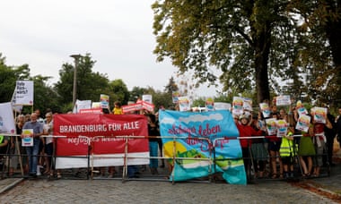 Protesters hold up signs saying “Refugees Welcome” outside the election party of Alternative für Deutschland (AfD) in Potsdam, September 2019.
