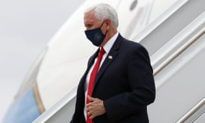Mike Pence wears a face mask as he arrives in Dallas Sunday.