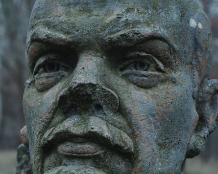 A still from Graft Versus Host, showing the statue of Lenin in Potsdam Volkspark outside Berlin.