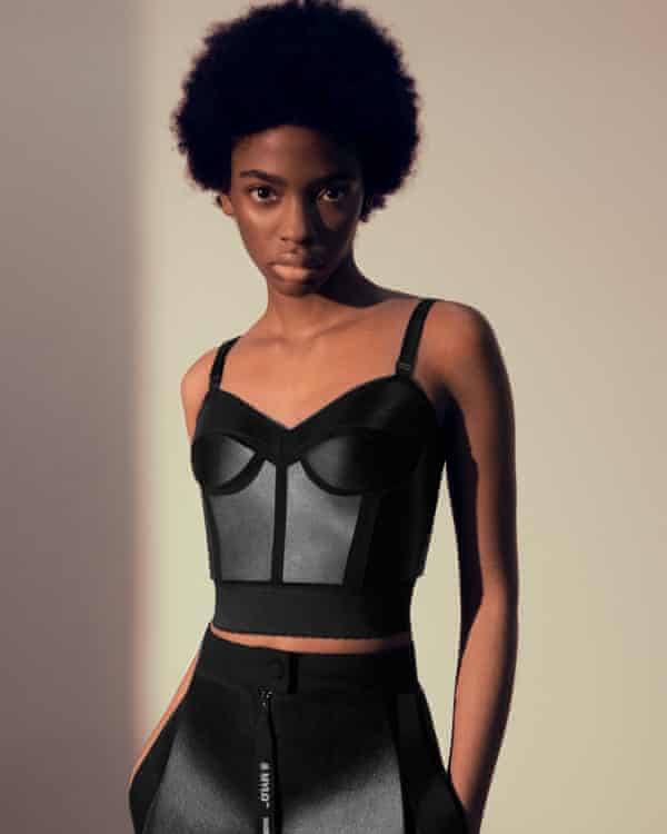 An outfit by Stella McCartney made from Mylo. Model wears basque-style top and faux leather trousers