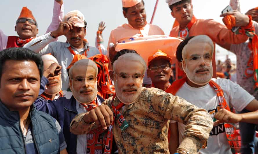 Supporters of Narendra Modi attend an election campaign rally in Meerut, Uttar Pradesh.