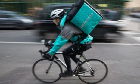 A Deliveroo rider on a London street