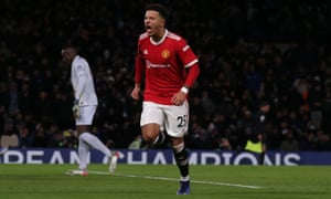 Jadon Sancho of Manchester United celebrates scoring their first goal during the Premier League match between Chelsea and Manchester United at Stamford Bridge on November 28, 2021 in London, England. (Photo by Matthew Peters/Manchester United via Getty Images)