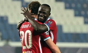 Diogo Jota (left) and Sadio Mané celebrate during their rout of Atalanta.