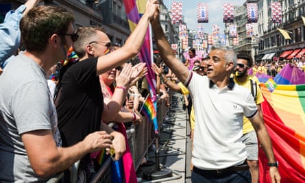 Sadiq Khan high-fives people during Pride in London
