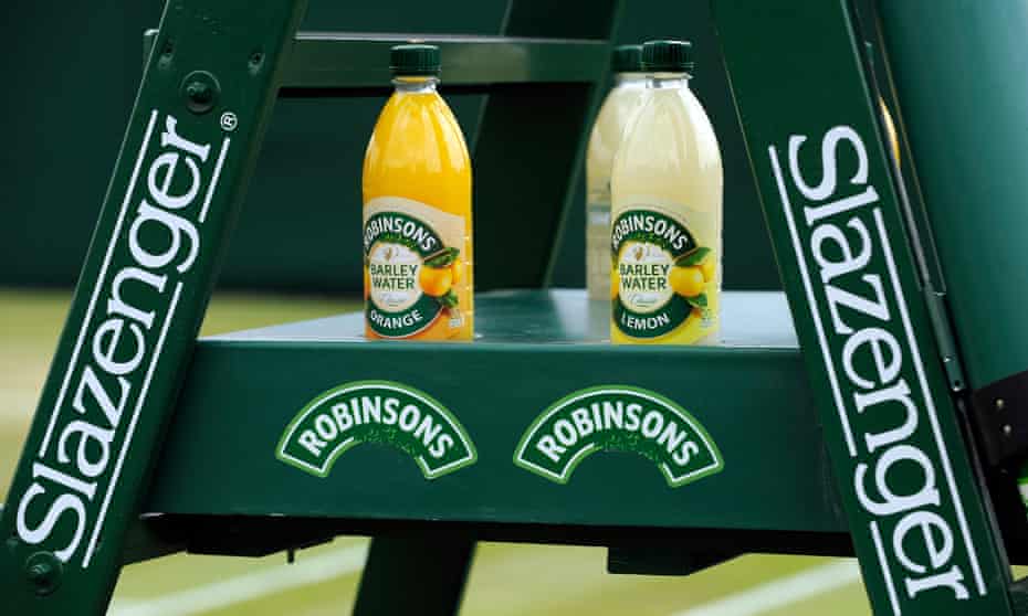 Two Robinsons beverages are seen on a Slazenger stand.