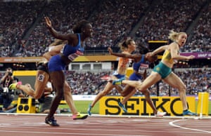 Australia’s Sally Pearson crosses the line to win the gold in the women’s 100m hurdles.