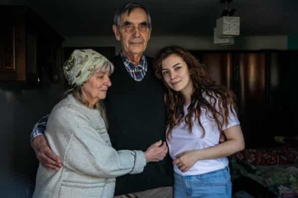 Psychologist Katerina Shukh with her grandparents, Kateryna Nemenushyaya and Viktor Nemeenushiy, who recently joined her in Borzęcin Duży, Poland.