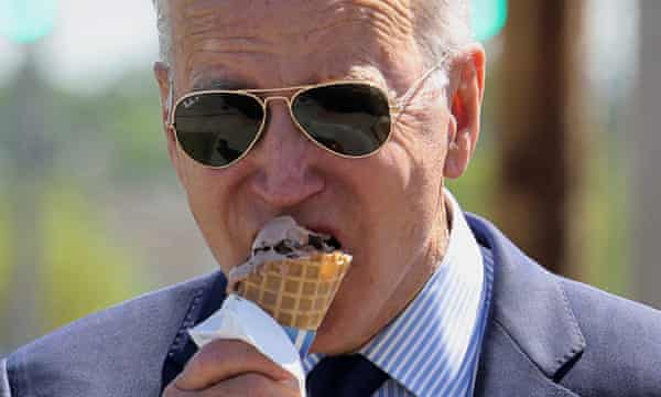 US president Joe Biden eats an ice-cream.