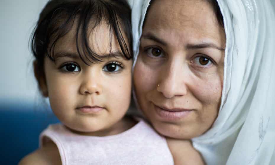 Mehreen Ibrahim and her daughter Eshal Haider, at their Pooraka home in Adelaide. Mehreen’s husband is in detention and she has not seen him in 2 and half years. Photo by Kelly Barnes for the Guardian