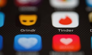 Serial Killer Conviction Prompts Police To Warn Of Dating App Dangers<br>LONDON, ENGLAND - NOVEMBER 24:  The "Grindr" and "Tinder" app logos are seen on a mobile phone screen on November 24, 2016 in London, England.  Following a number of deaths linked to the use of anonymous online dating apps, the police have warned users to be aware of the risks involved, following the growth in the scale of violence and sexual assaults linked to their use.  (Photo by Leon Neal/Getty Images)
