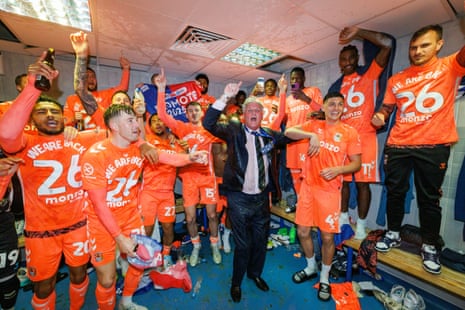 King celebrates promotion with his players at Ewood Park
