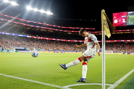 Arda Guler (8) of Turkey takes a corner kick.