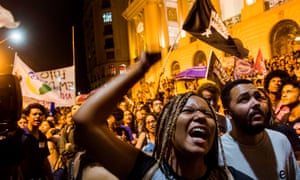 Fury … demonstrations in the streets following the blaze.