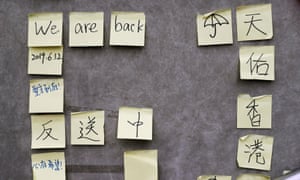 Notes against the proposed extradition bill are seen near the Legislative Council building in Hong Kong.