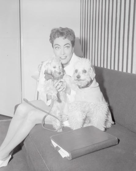 Joan Crawford with Cliquot, in 1955.