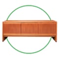 Furniture cut-out inside green-rimmed circle