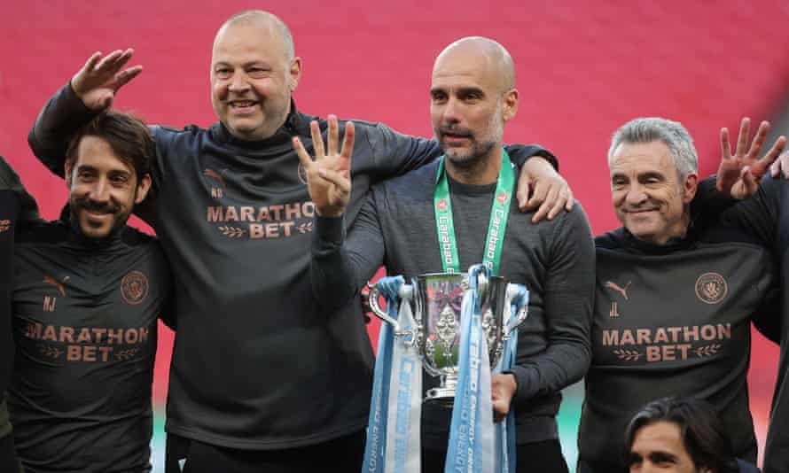 Guardiola celebrates his fourth League Cup win with Manchester City last weekend.
