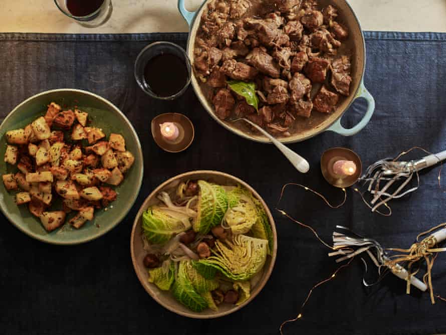 Rachel Roddy’s roast pork and juniper berries, with roast potatoes, cabbage and chestnuts