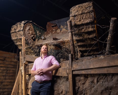 Staff Sgt Anthony Cherrett, pictured with a Mark 1 tank at Bovington Tank Museum