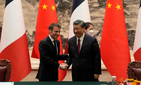 China’s President Xi Jinping shakes hands with his French counterpart Emmanuel Macron after the signing ceremony in Beijing.