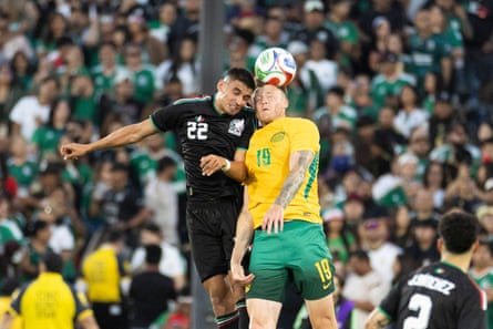 Australia’s Harry Souttar and Mexico’s Guillermo Martinez vie for the ball at the Rose Bowl