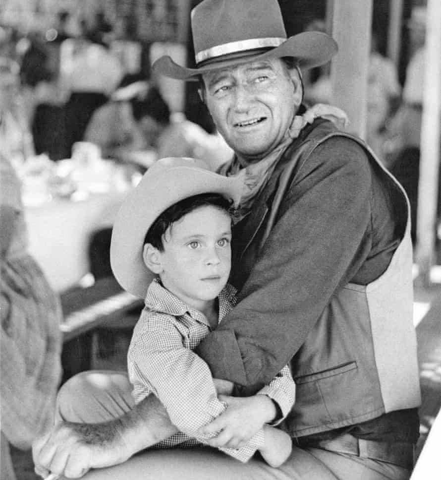 John Wayne with his young son Ethan.