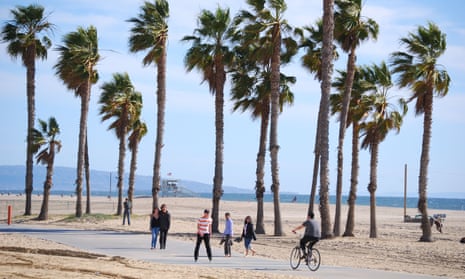 People visit Santa Monica beach in Los Angeles county.