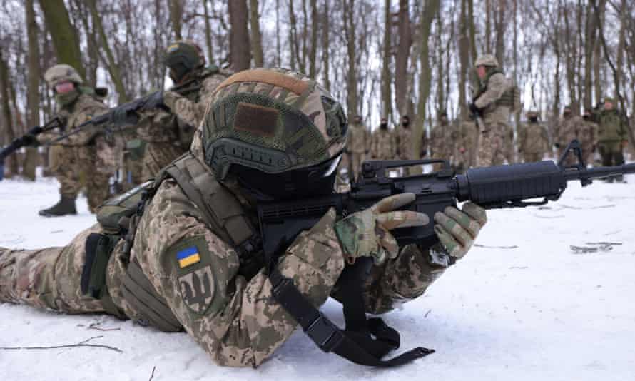 Civilian participants in a Kyiv territorial defence unit train on a Saturday in a forest in Ukraine.