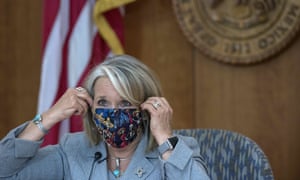Michelle Lujan Grisham, governor of New Mexico, wearing a Dia de los Murtos mask at her weekly update on the Covid-19 emergency in Santa Fe.