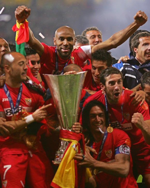 Frédéric Kanouté and his Sevilla teammates celebrate with the Uefa Cup after beating Espanyol on penalties in 2007.