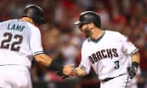 Surprise triple powers Diamondbacks past Rockies in NL wild-card game
