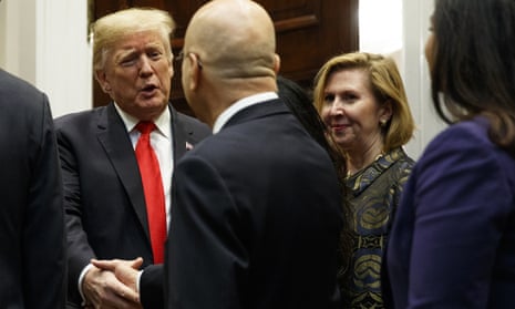 The deputy national security adviser, Mira Ricardel, right, watches as Donald Trump arrives for a Diwali ceremony in the Roosevelt Room of the White House on Tuesday.