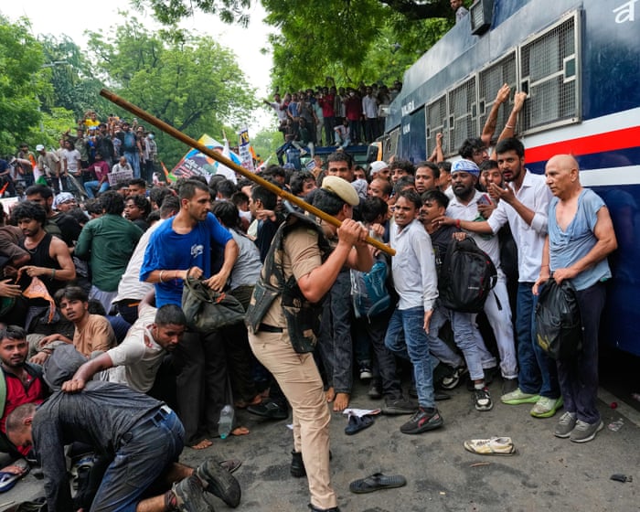 India’s Cockroach party supporters march on parliament in New Delhi