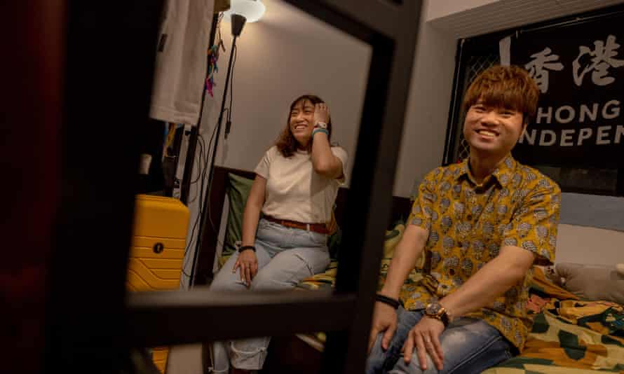 Natalie Wong and Kenneth Ip in their home in Taipei. ‘I feel regret, but not always,’ says Wong, ‘and I’m so proud of myself.’