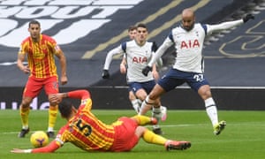 Lucas Moura is tackled by Kyle Bartley in the early stages.
