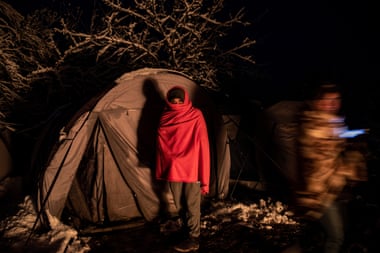 Asmad in front of his tent at the Vucjak migrants camp.