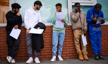 Pupils collecting their GCSE results at Burnage academy