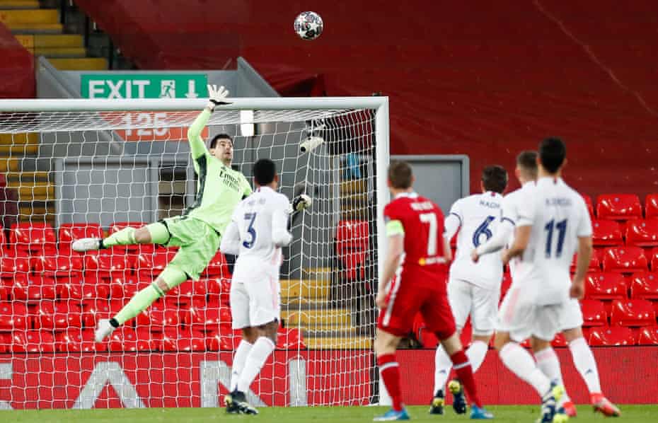Thibaut Courtois saves James Milner’s long-range effort.