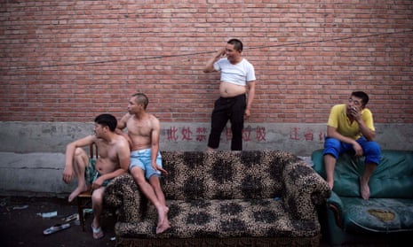 Men in a migrant village on the outskirts of Beijing. 